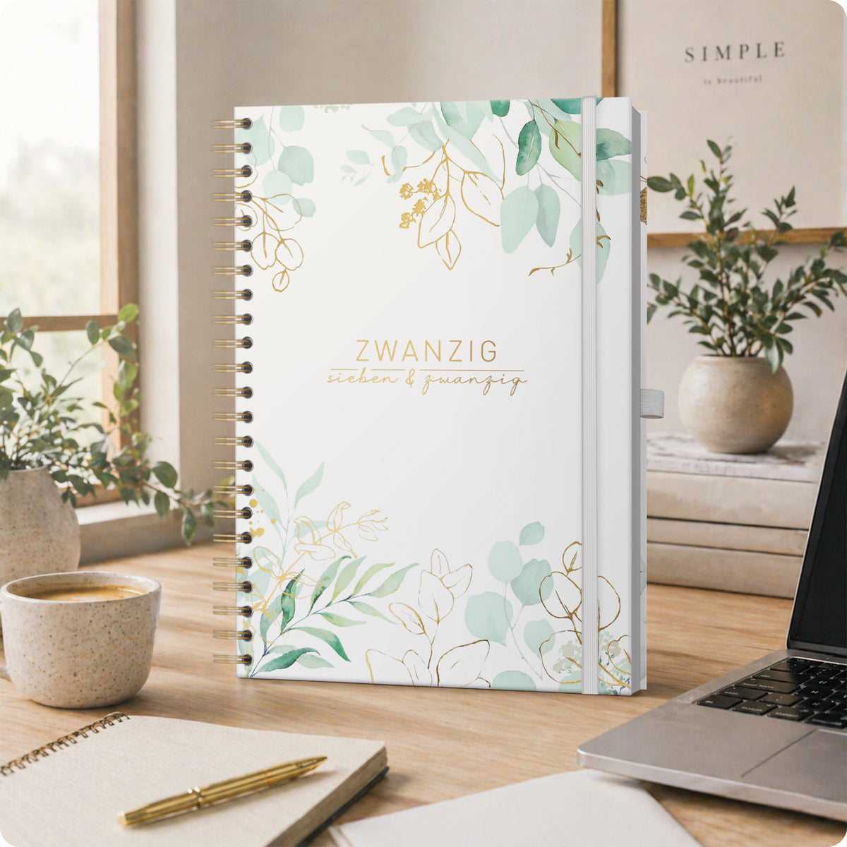 Lifestyle-Ansicht von Häfft Business-Timer Kalender 2027 A4 - Planer im Motiv „Blattgold“ im Einsatz.