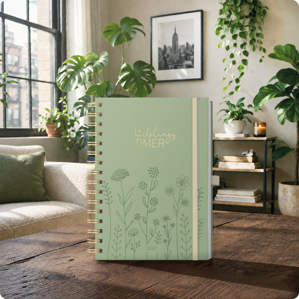 Lifestyle-Ansicht von Häfft Lieblings-Timer Deluxe Ringbuch-Kalender 2027 A5 im Motiv „Fine Flowers“ im Einsatz.